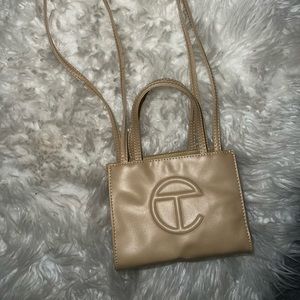 Cream mini teflar bag